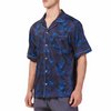 Men's Short sleeve black and blue all over palm frond printed camp shirt in a relaxed fit with a chest pocket made from knit fabric on a model - quarter view