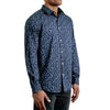 three quarters side view of men's long sleeve, slim fit, navy floral patterned button up shirt on a black model