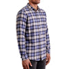 three quarters side view of men's long sleeve, slim fit,  blue and white plaid button up shirt on a black model