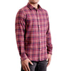 three quarters side view of men's long sleeve, slim fit,  maroon plaid flannel button up shirt on a black model