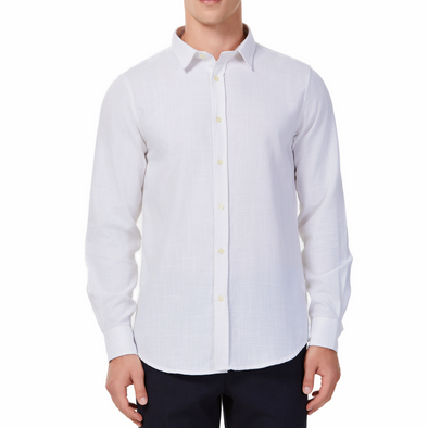 Men's white textured linen long sleeve button up shirt with a pointed collar on a model. Image is cropped to the torso and model is angled to the models right