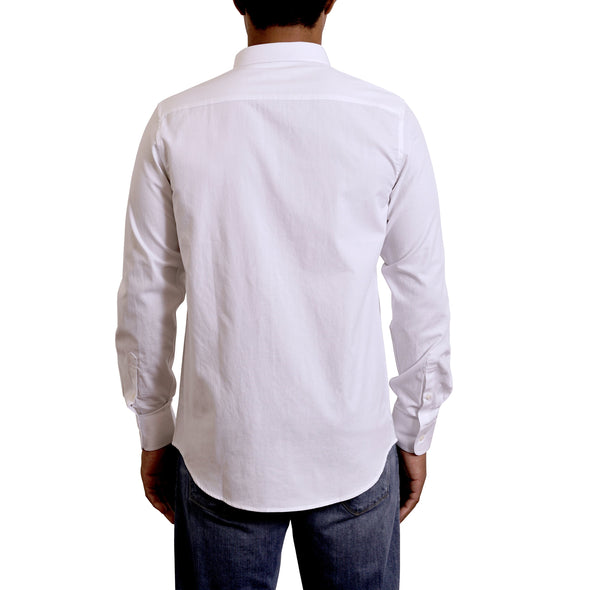 close up view of the pointed collar and neck area of white cotton fabric button up shirt showing the small crosshatch texture woven into the shirt. Worn by a black male model. The top buttons are undone